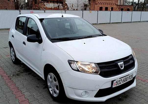 Dacia Sandero cena 23900 przebieg: 140512, rok produkcji 2014 z Ślesin małe 137